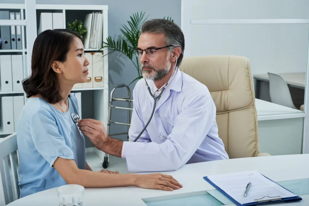 Primary Care Physician with a patient